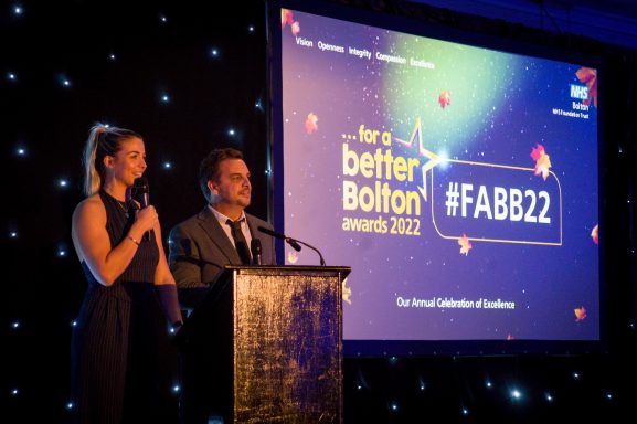 Gemma Atkinson and Mike Toolan on stage at Bolton NHS awards